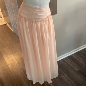 Pink Ruched  Maxi Skirt by future collection. This is fitting for a beach